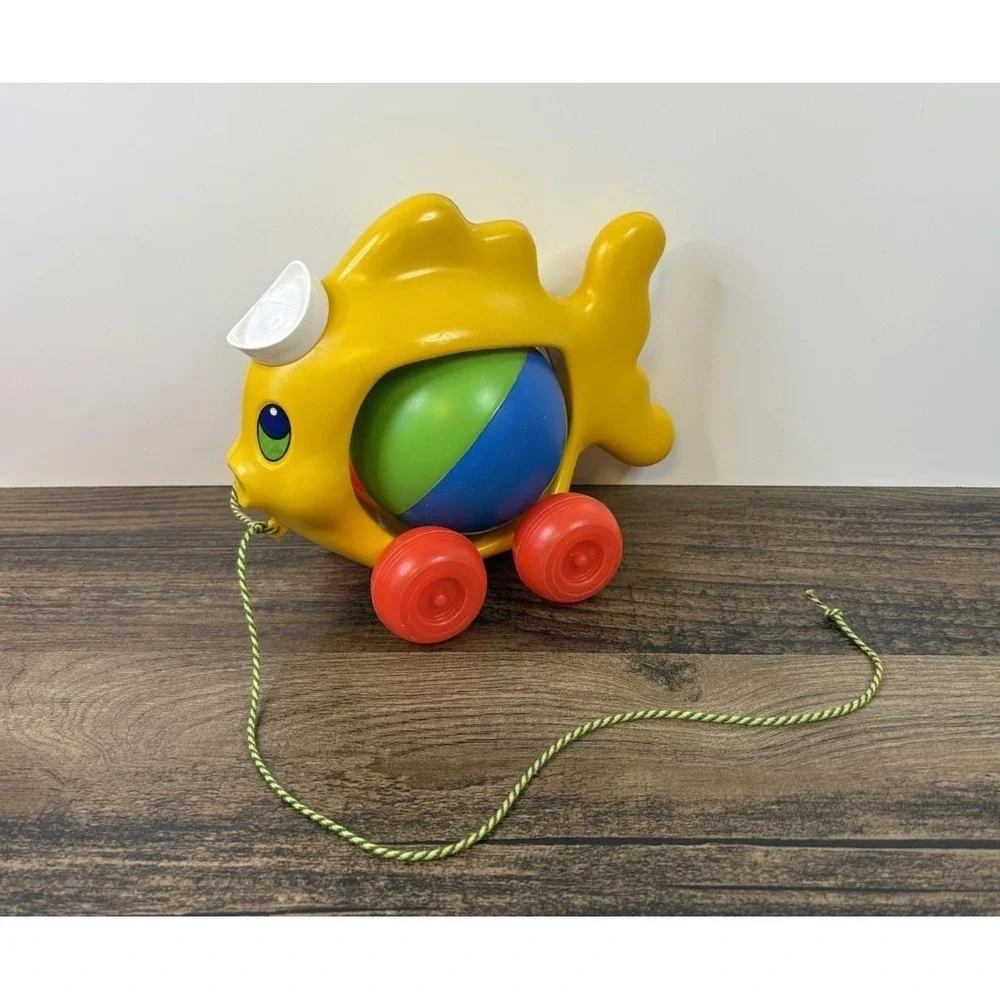 Vintage Pull Along Fish Toy Rolling Ball Rattle Plastic Sailor Hat